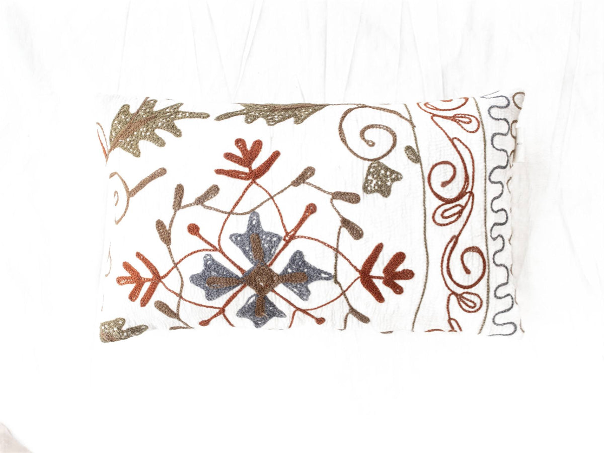Suzani pillowcase 30x50 cm in white cotton with colorful embroidery of flowers and sling in brown rust blue gray boho vintage oriental style