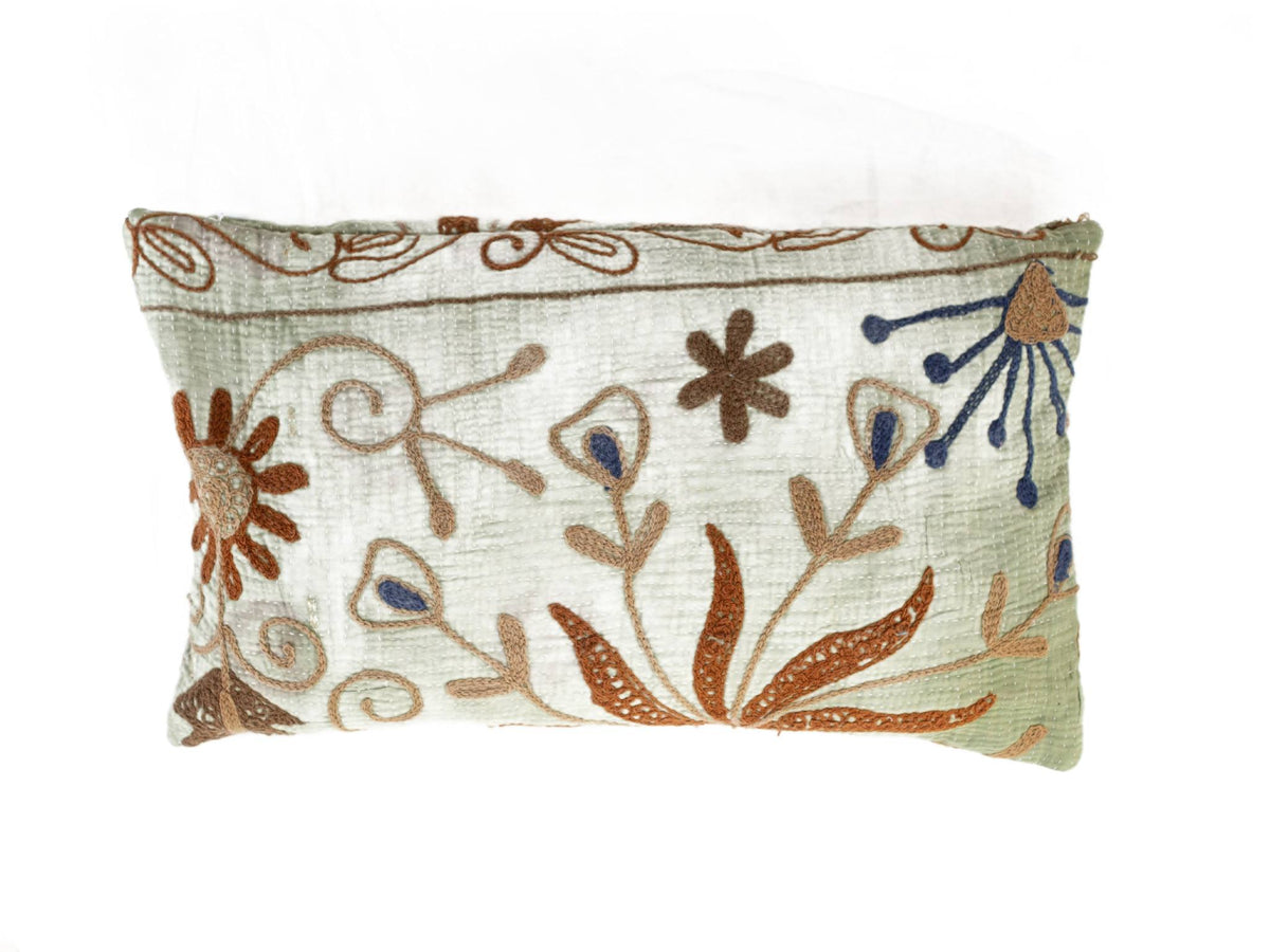 Unique suzani pillowcase 30x50 cm in white and light green with colorful embroidered patterns in rust brown and dark blue for boho ethnic sari pillow