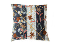 Unique boho suzani pillowcase 50x50 cm in dark blue patchwork with embroidered flowers in brown, gold and coral colors and light turquoise panels